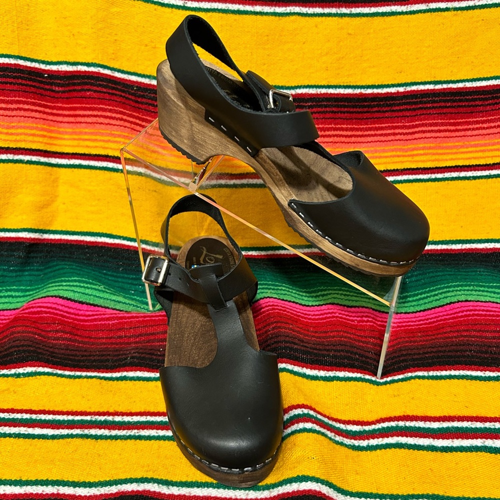 Lotta from Stockholm Low Wood T-Bar Clogs in Black on Brown Base Size 36